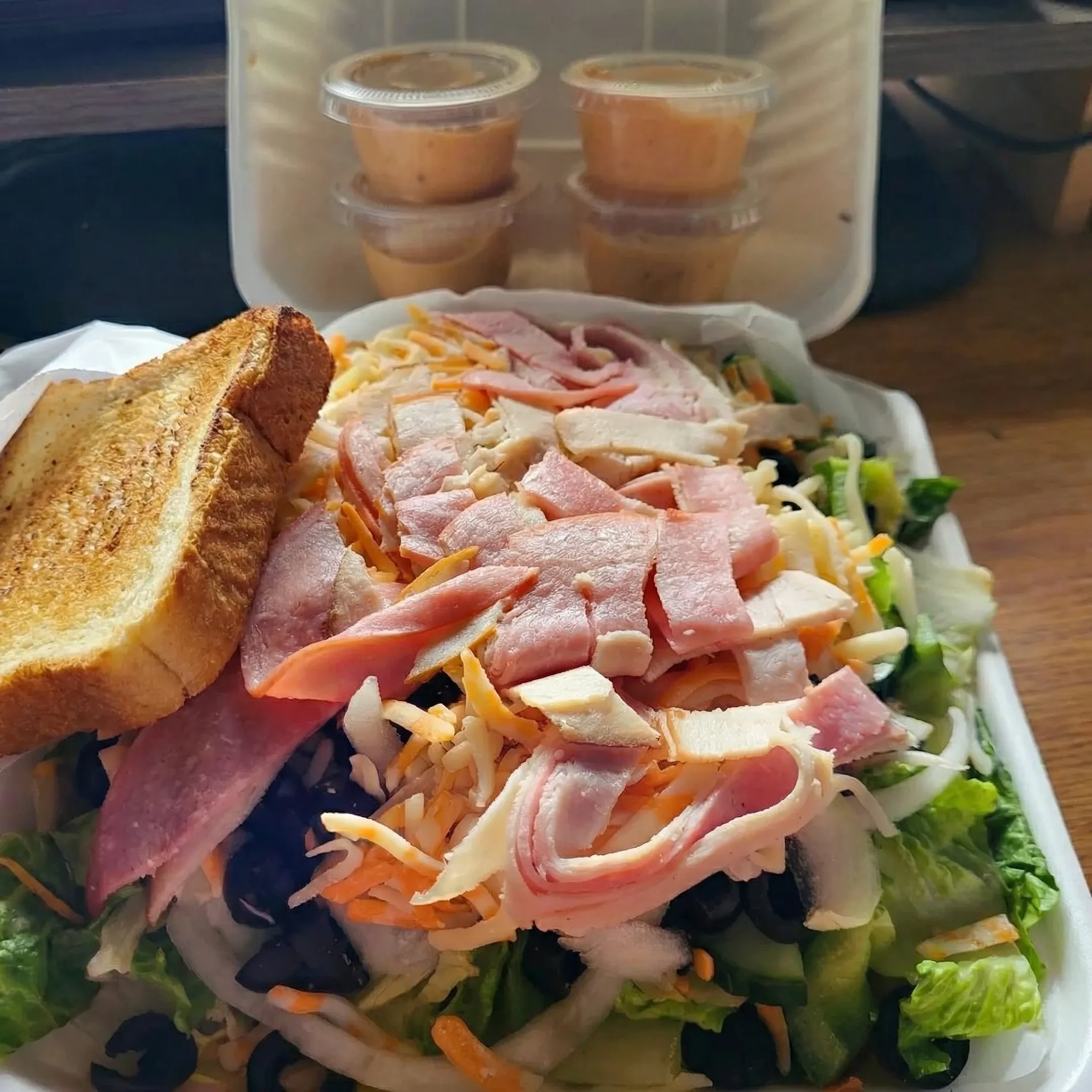 All meat pizza at Pappa's Family Restaurant & Lounge Edmonton - loaded pizza with bacon, pepperoni, ham, beef, and salami